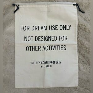 Golden Goose Cream Drawstring Bag with Black Text